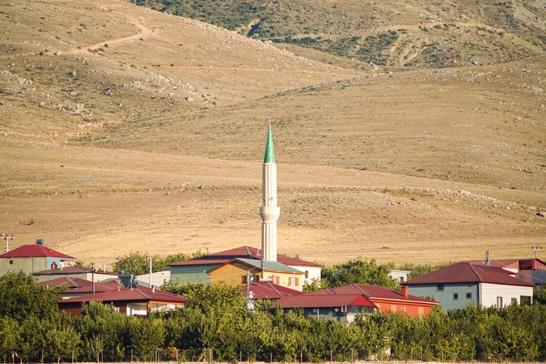 Village mosque below the mountains