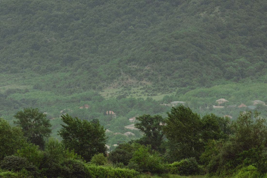 Retro car in the green hills