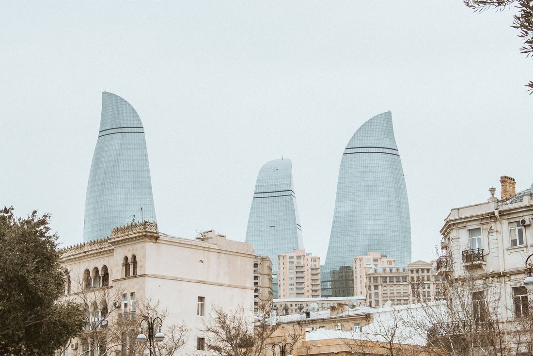 Flame Towers over historic Baku