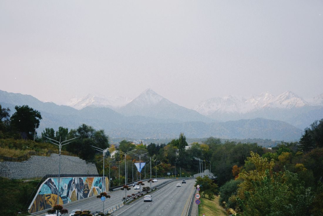 Road with mountain backdrop, Almaty